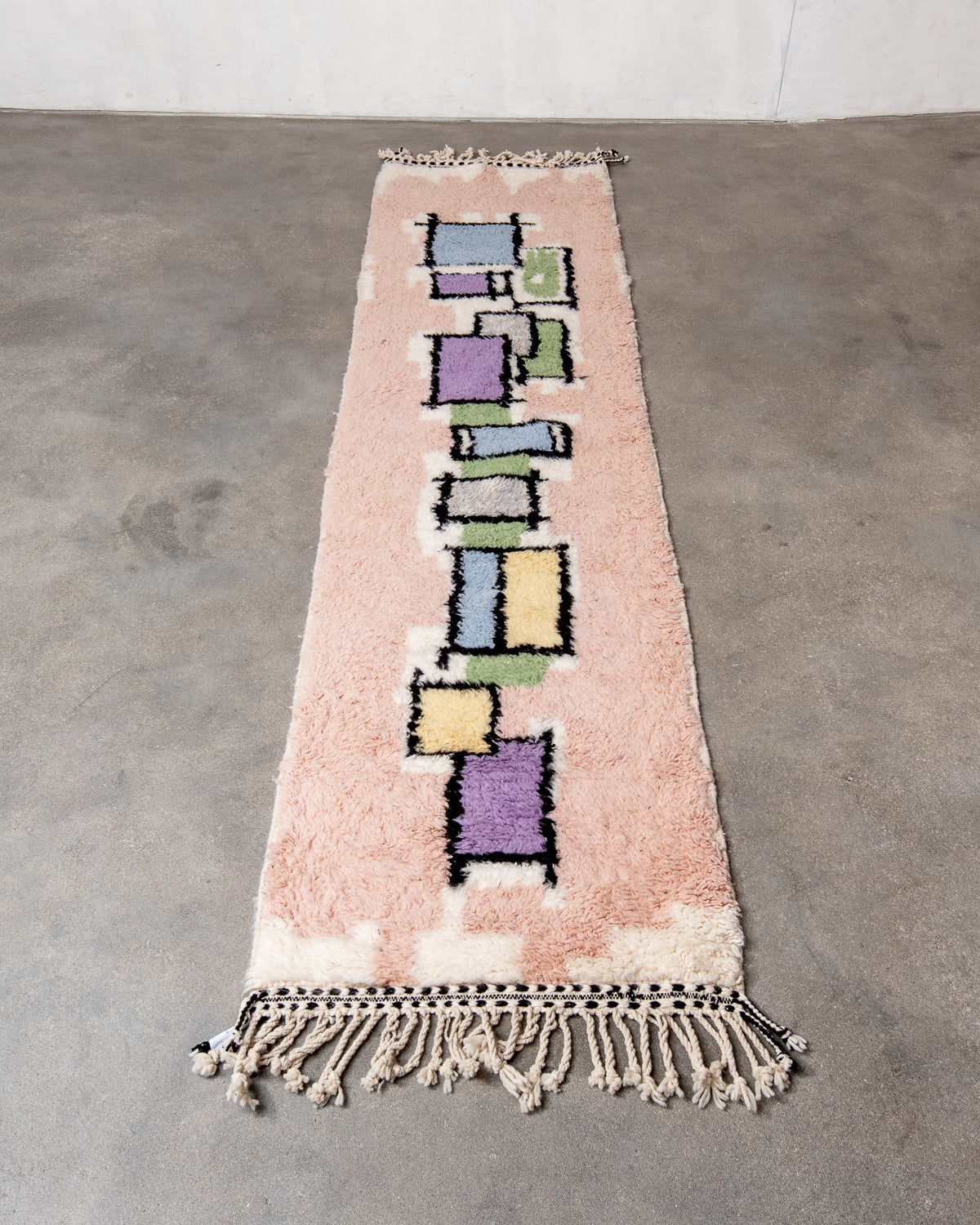 Modern, designer, handcrafted Berber runner rug from Morocco. Beniourain carpet with beautiful colours and patterns and fluffy wool texture.